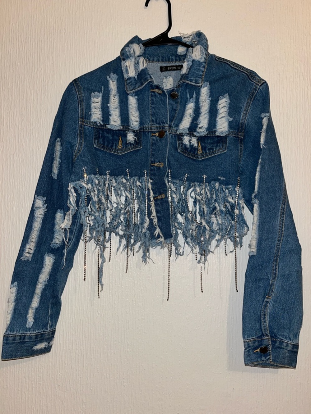 Distressed Cropped Denim Jacket with Fringe & Chain Detail